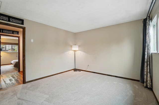 127 Saint Michelle St Unit 35B, Columbus, OH 43085 - carpeted empty room with baseboards
