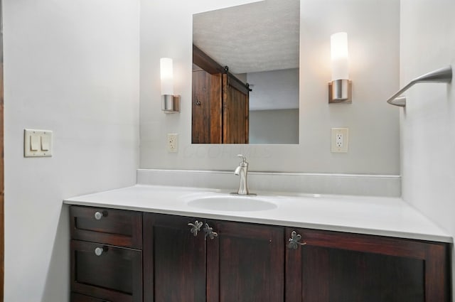 127 Saint Michelle St Unit 35B, Columbus, OH 43085 - bathroom with vanity and a textured ceiling