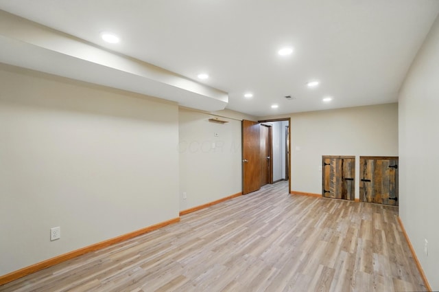127 Saint Michelle St Unit 35B, Columbus, OH 43085 - finished basement featuring recessed lighting, light wood-type flooring, and baseboards