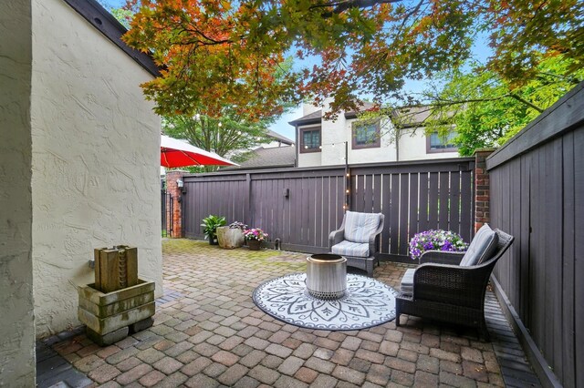 127 Saint Michelle St Unit 35B, Columbus, OH 43085 - fenced backyard with a patio