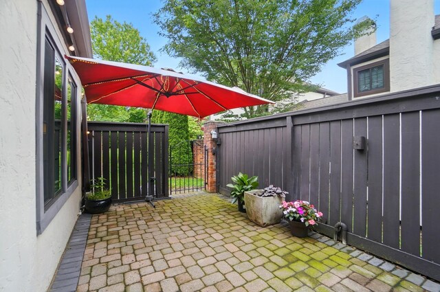 127 Saint Michelle St Unit 35B, Columbus, OH 43085 - view of patio featuring a gate