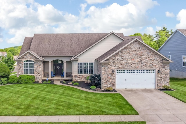 2036 Amber Wood Pl, Lancaster, OH 43130 - view of front of house featuring stone siding, a front lawn, a garage, and concrete driveway