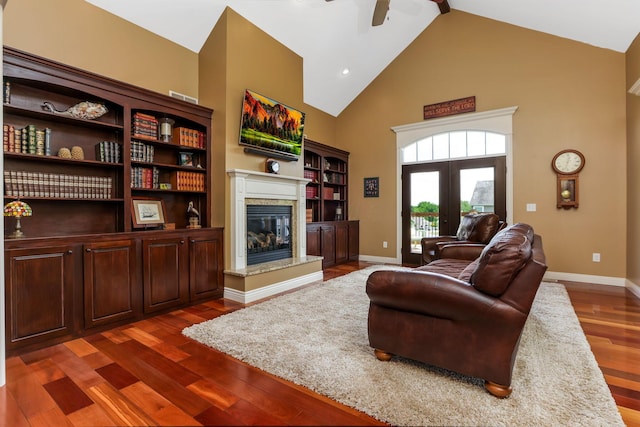 2036 Amber Wood Pl, Lancaster, OH 43130 - living area featuring high vaulted ceiling, french doors, a fireplace, baseboards, and dark wood-type flooring