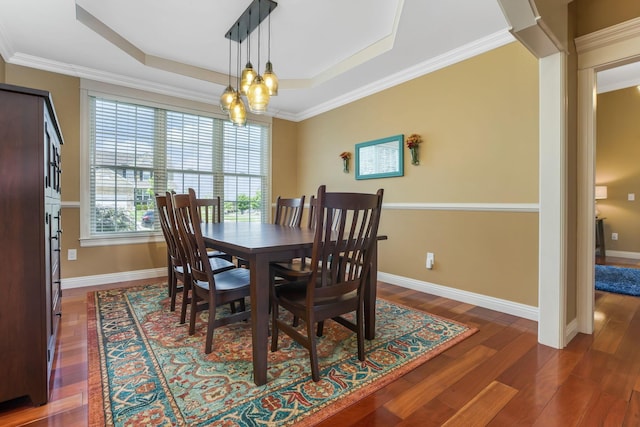 2036 Amber Wood Pl, Lancaster, OH 43130 - dining space with a raised ceiling, dark wood-type flooring, baseboards, a chandelier, and crown molding