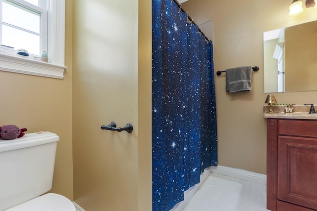 2036 Amber Wood Pl, Lancaster, OH 43130 - bathroom featuring toilet, vanity, baseboards, and curtained shower