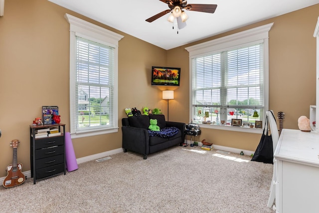2036 Amber Wood Pl, Lancaster, OH 43130 - living area with carpet flooring, ceiling fan, and baseboards