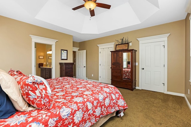 2036 Amber Wood Pl, Lancaster, OH 43130 - carpeted bedroom with baseboards, ceiling fan, and ensuite bath
