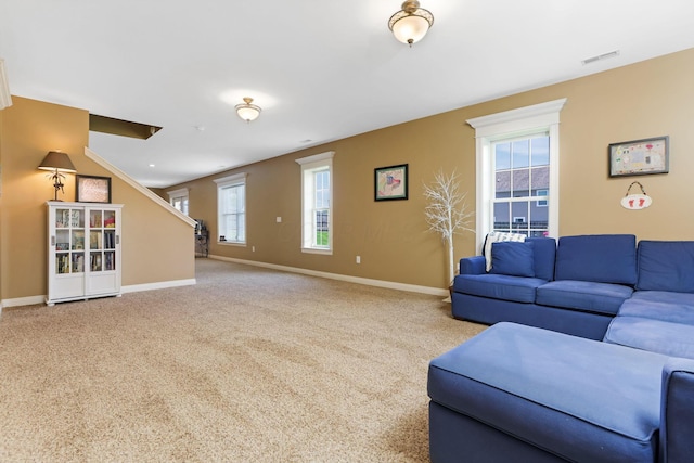 2036 Amber Wood Pl, Lancaster, OH 43130 - living room featuring baseboards, carpet floors, and stairs