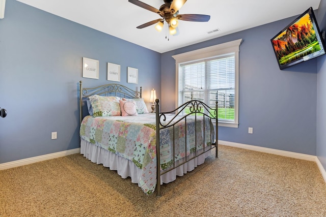 2036 Amber Wood Pl, Lancaster, OH 43130 - carpeted bedroom featuring baseboards and a ceiling fan