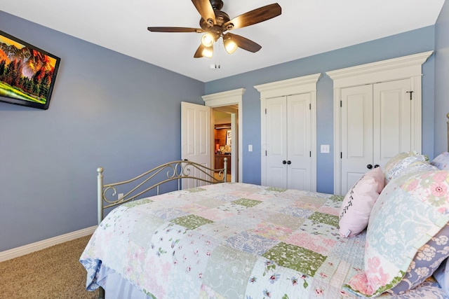 2036 Amber Wood Pl, Lancaster, OH 43130 - bedroom with two closets, carpet floors, baseboards, and a ceiling fan