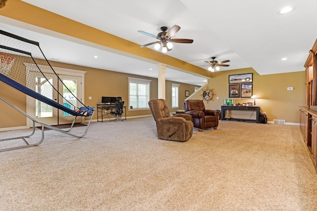 2036 Amber Wood Pl, Lancaster, OH 43130 - carpeted living area featuring baseboards, a ceiling fan, recessed lighting, plenty of natural light, and ornate columns