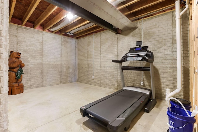 2036 Amber Wood Pl, Lancaster, OH 43130 - exercise room featuring brick wall