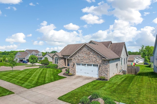 2036 Amber Wood Pl, Lancaster, OH 43130 - view of front of house featuring stone siding, concrete driveway, an attached garage, central air condition unit, and a shingled roof
