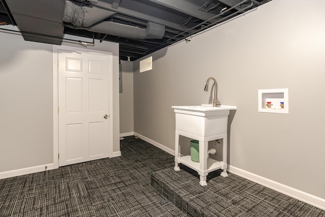 162 E Morrill Ave, Columbus, OH 43207 - finished below grade area featuring dark colored carpet and baseboards
