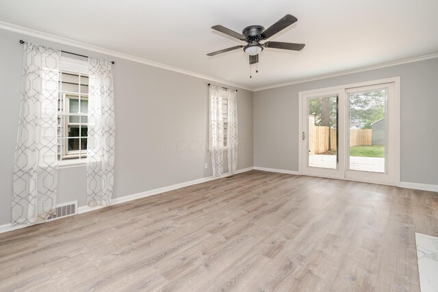 162 E Morrill Ave, Columbus, OH 43207 - unfurnished room with crown molding, wood finished floors, baseboards, and ceiling fan