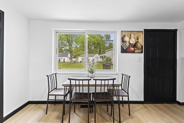 1530 Lexdale Dr, Reynoldsburg, OH 43068 - dining room featuring wood finished floors and baseboards