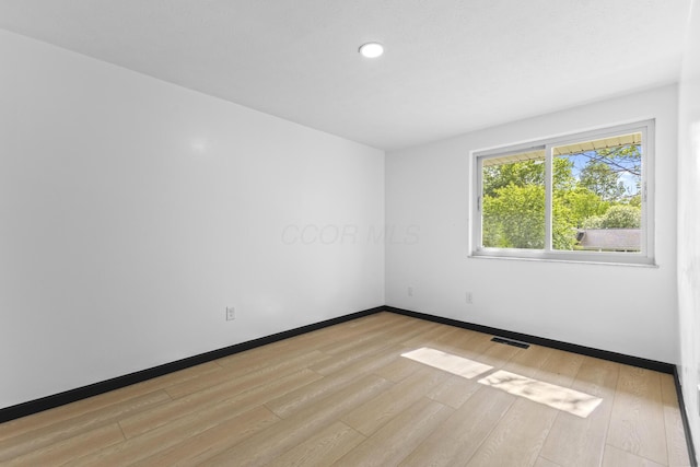 1530 Lexdale Dr, Reynoldsburg, OH 43068 - unfurnished room with light wood-style flooring, baseboards, and recessed lighting