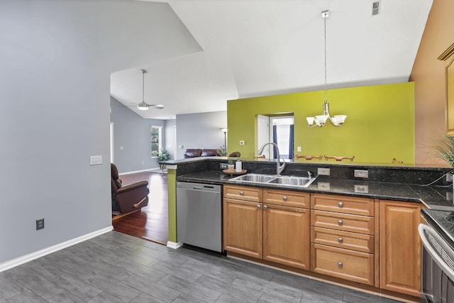 6542 Lakeview Cir, Canal Winchester, OH 43110 - kitchen with appliances with stainless steel finishes, a sink, a chandelier, open floor plan, and brown cabinets