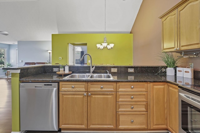 6542 Lakeview Cir, Canal Winchester, OH 43110 - kitchen with stainless steel appliances, a sink, dark stone counters, and open floor plan