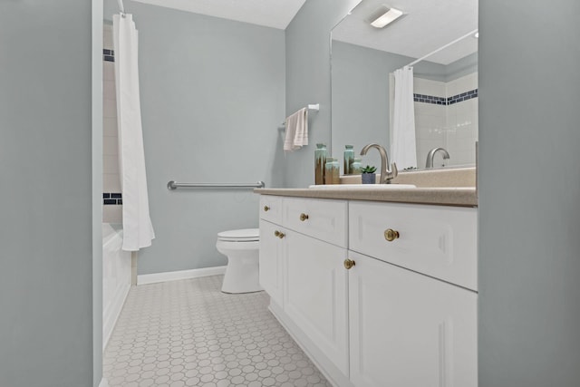 6542 Lakeview Cir, Canal Winchester, OH 43110 - bathroom with toilet, vanity, baseboards, and shower / bath combination with curtain
