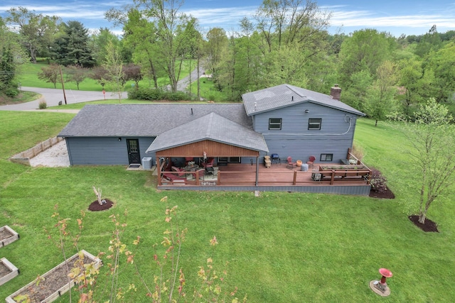 699 Cedar Run Rd NE, Newark, OH 43055 - back of house with a yard, a garden, a deck, a chimney, and a patio area