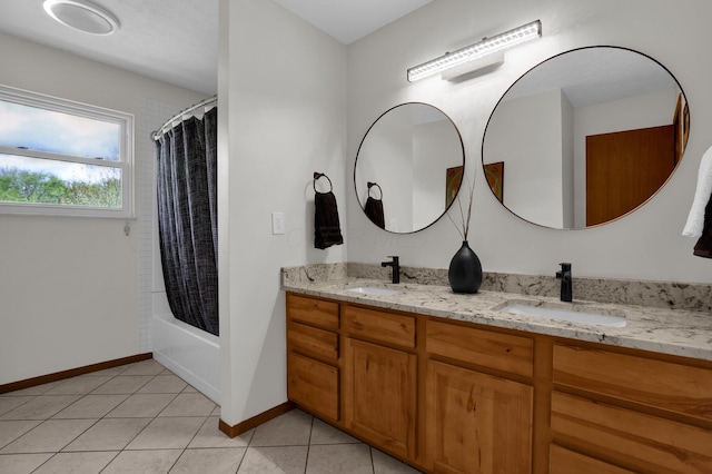 699 Cedar Run Rd NE, Newark, OH 43055 - full bath featuring double vanity, baseboards, shower / bath combo, and tile patterned floors