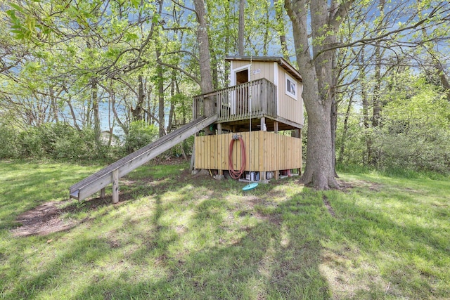 699 Cedar Run Rd NE, Newark, OH 43055 - back of house featuring a lawn and a balcony