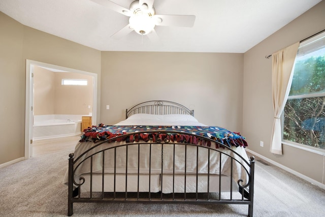 272 Trail E, Etna, OH 43062 - carpeted bedroom with baseboards, ensuite bathroom, and a ceiling fan