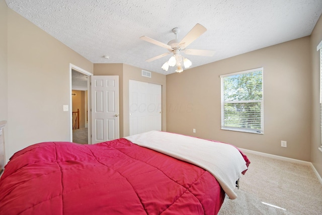 272 Trail E, Etna, OH 43062 - carpeted bedroom featuring a textured ceiling, ceiling fan, and baseboards