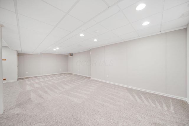 272 Trail E, Etna, OH 43062 - finished below grade area with light colored carpet, baseboards, recessed lighting, and a paneled ceiling