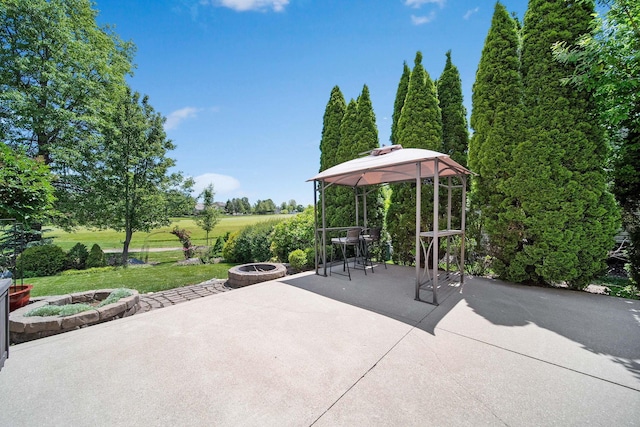272 Trail E, Etna, OH 43062 - view of patio / terrace featuring an outdoor fire pit and a gazebo