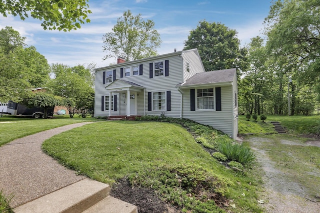 498 Manor, Newark, OH 43055 - colonial-style house with a front lawn and a chimney