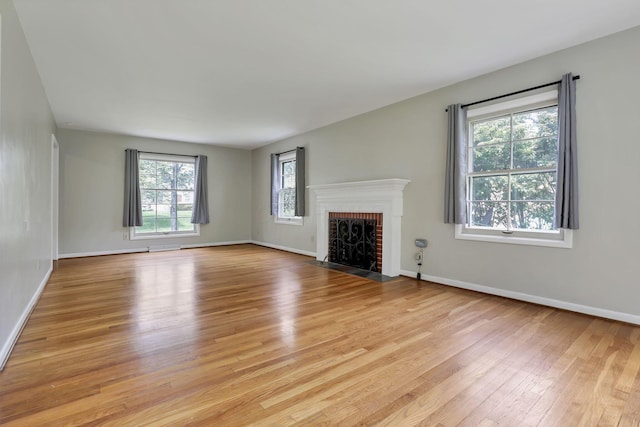498 Manor, Newark, OH 43055 - unfurnished living room featuring light wood finished floors, baseboards, and a fireplace