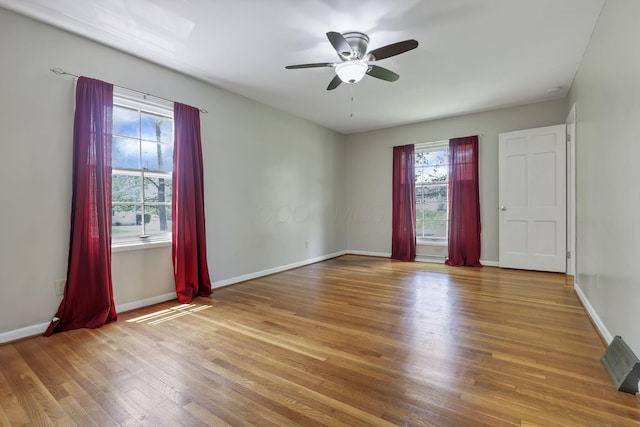 498 Manor, Newark, OH 43055 - empty room featuring wood finished floors, a ceiling fan, and baseboards