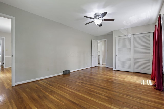 498 Manor, Newark, OH 43055 - unfurnished bedroom featuring baseboards, wood finished floors, a closet, and a ceiling fan