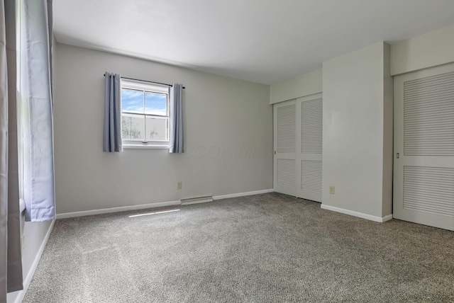 498 Manor, Newark, OH 43055 - unfurnished bedroom with carpet, baseboards, and a closet