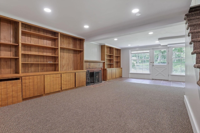498 Manor, Newark, OH 43055 - unfurnished living room with light colored carpet, a fireplace, recessed lighting, and built in shelves