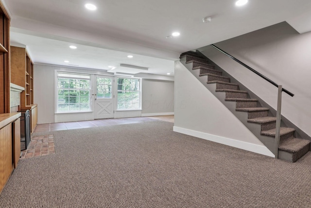 498 Manor, Newark, OH 43055 - unfurnished living room featuring recessed lighting, stairs, light carpet, and baseboards