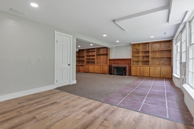 498 Manor, Newark, OH 43055 - unfurnished living room featuring a fireplace, wood finished floors, recessed lighting, and baseboards