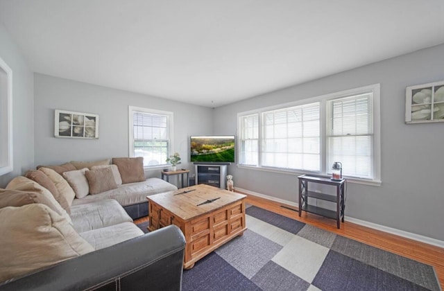 164 Sturbridge Rd, Columbus, OH 43228 - living room with dark wood-style flooring and baseboards
