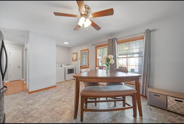 164 Sturbridge Rd, Columbus, OH 43228 - dining space with independent washer and dryer, ceiling fan, and baseboards