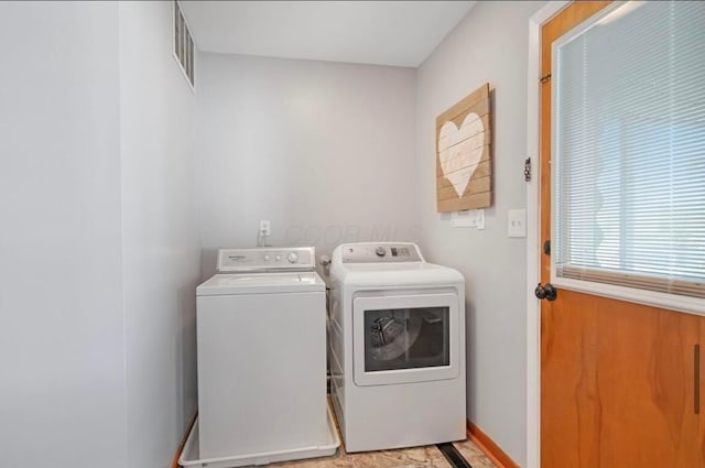 164 Sturbridge Rd, Columbus, OH 43228 - washroom featuring washer and clothes dryer and baseboards