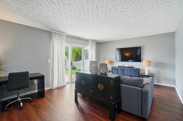 7221 Dewfall Dr, Reynoldsburg, OH 43068 - living area featuring dark wood-style floors, an office area, baseboards, and a textured ceiling