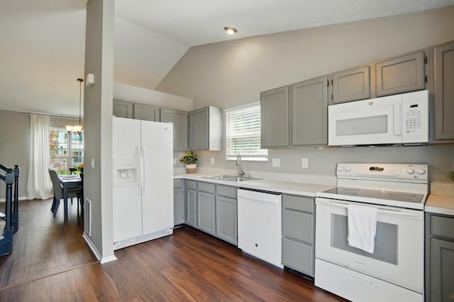 7221 Dewfall Dr, Reynoldsburg, OH 43068 - kitchen featuring white appliances, a sink, gray cabinetry, plenty of natural light, and vaulted ceiling