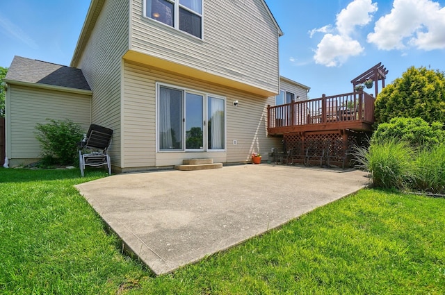7221 Dewfall Dr, Reynoldsburg, OH 43068 - back of house featuring a deck, a patio area, and a lawn
