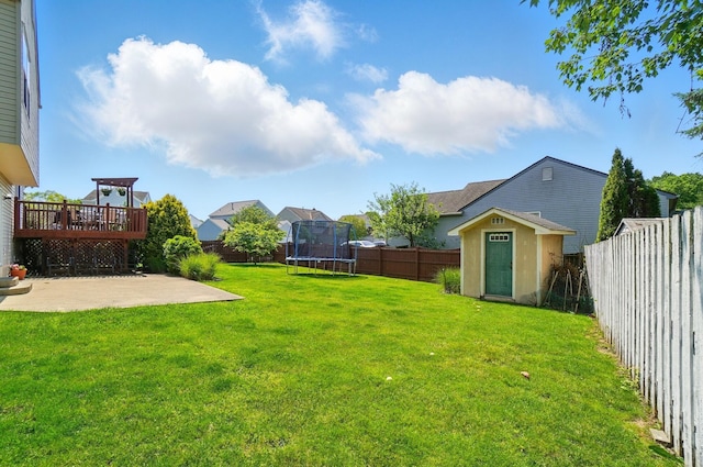 7221 Dewfall Dr, Reynoldsburg, OH 43068 - view of yard with a trampoline, a patio, and a deck
