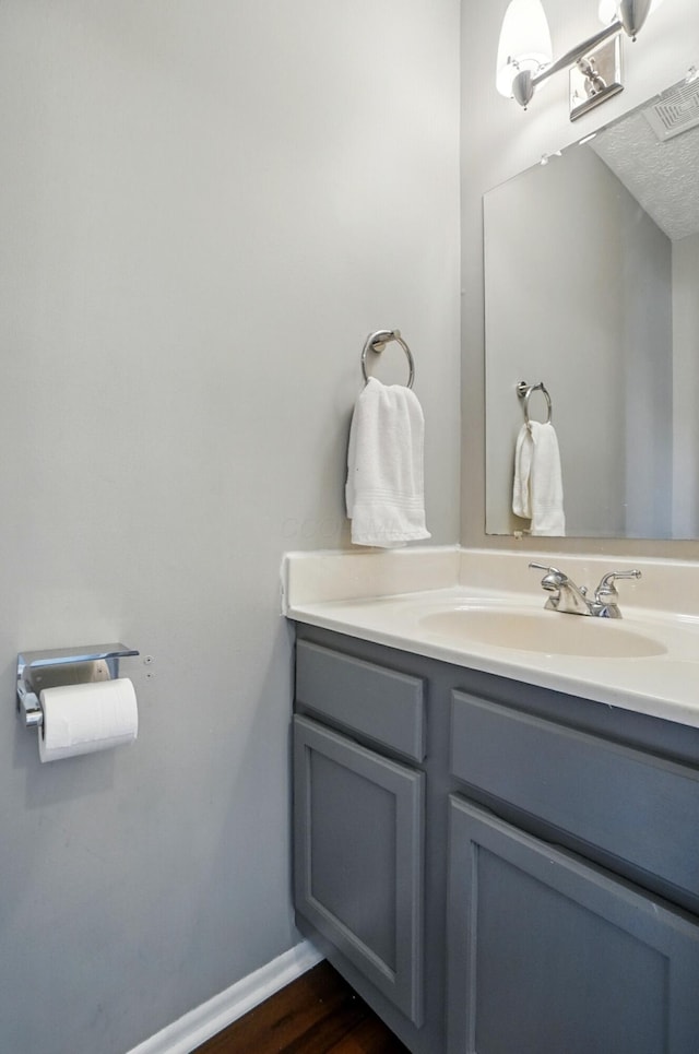 7221 Dewfall Dr, Reynoldsburg, OH 43068 - bathroom featuring vanity and wood finished floors