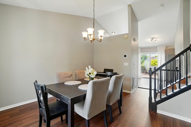 7221 Dewfall Dr, Reynoldsburg, OH 43068 - dining space with a chandelier, baseboards, stairway, and wood finished floors