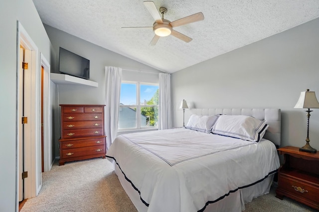 7221 Dewfall Dr, Reynoldsburg, OH 43068 - carpeted bedroom featuring a textured ceiling, vaulted ceiling, and ceiling fan