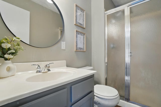 7221 Dewfall Dr, Reynoldsburg, OH 43068 - bathroom featuring a stall shower, toilet, and vanity